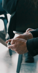 Close up of someone's hands holding a cellphone